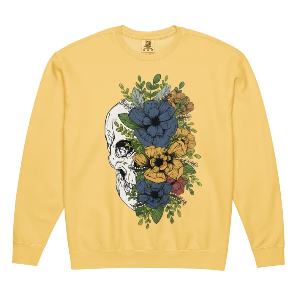 Yellow sweatshirt with a skull and floral design on a white background