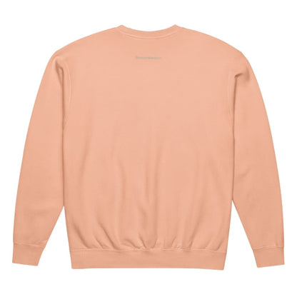 Peach-colored sweatshirt on a white background