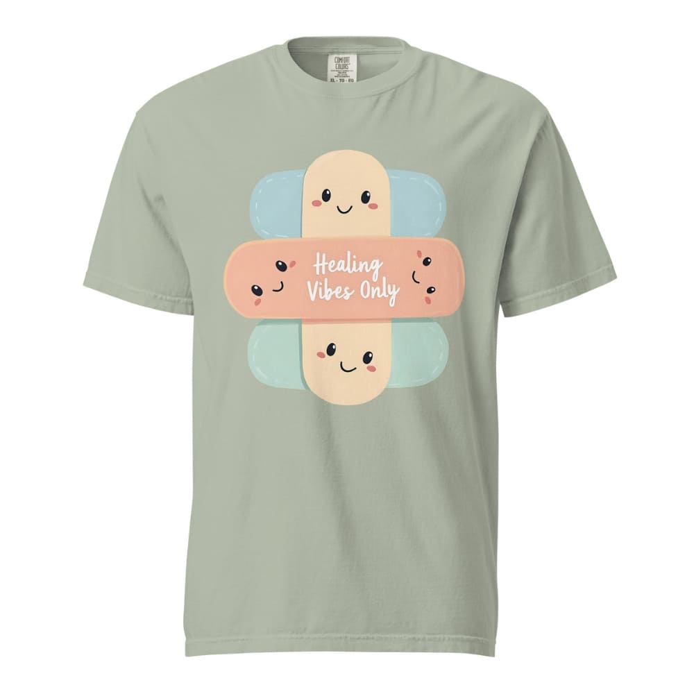 Light green t-shirt with cartoon bandages and 'Healing Vibes Only' text on a white background