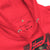 Close-up of a red hoodie with Spider-Man design and label details.