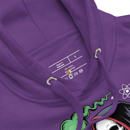 Close-up of a purple hoodie with a label and graphic design on the chest.