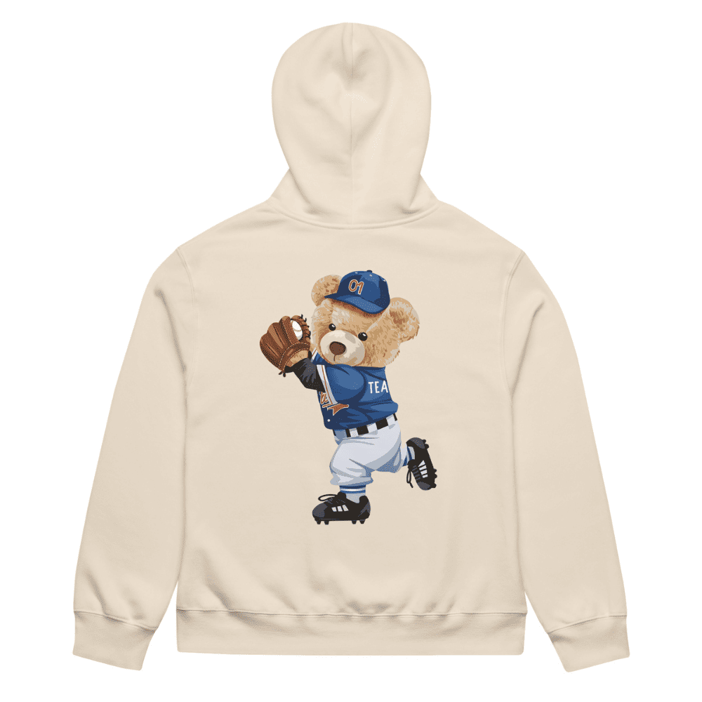 Beige hoodie with a bear in a baseball uniform on the back against a white background