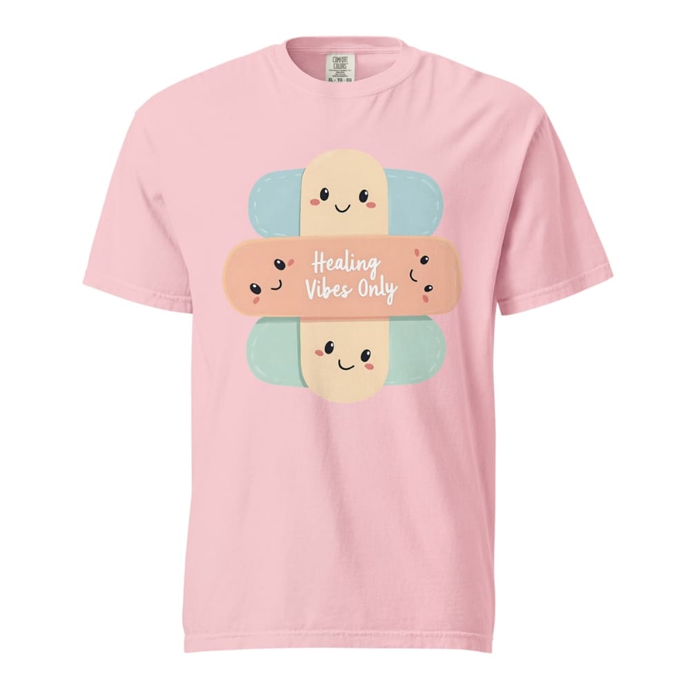 Pink t-shirt with cartoon bandages and 'Healing Vibes Only' text on a white background