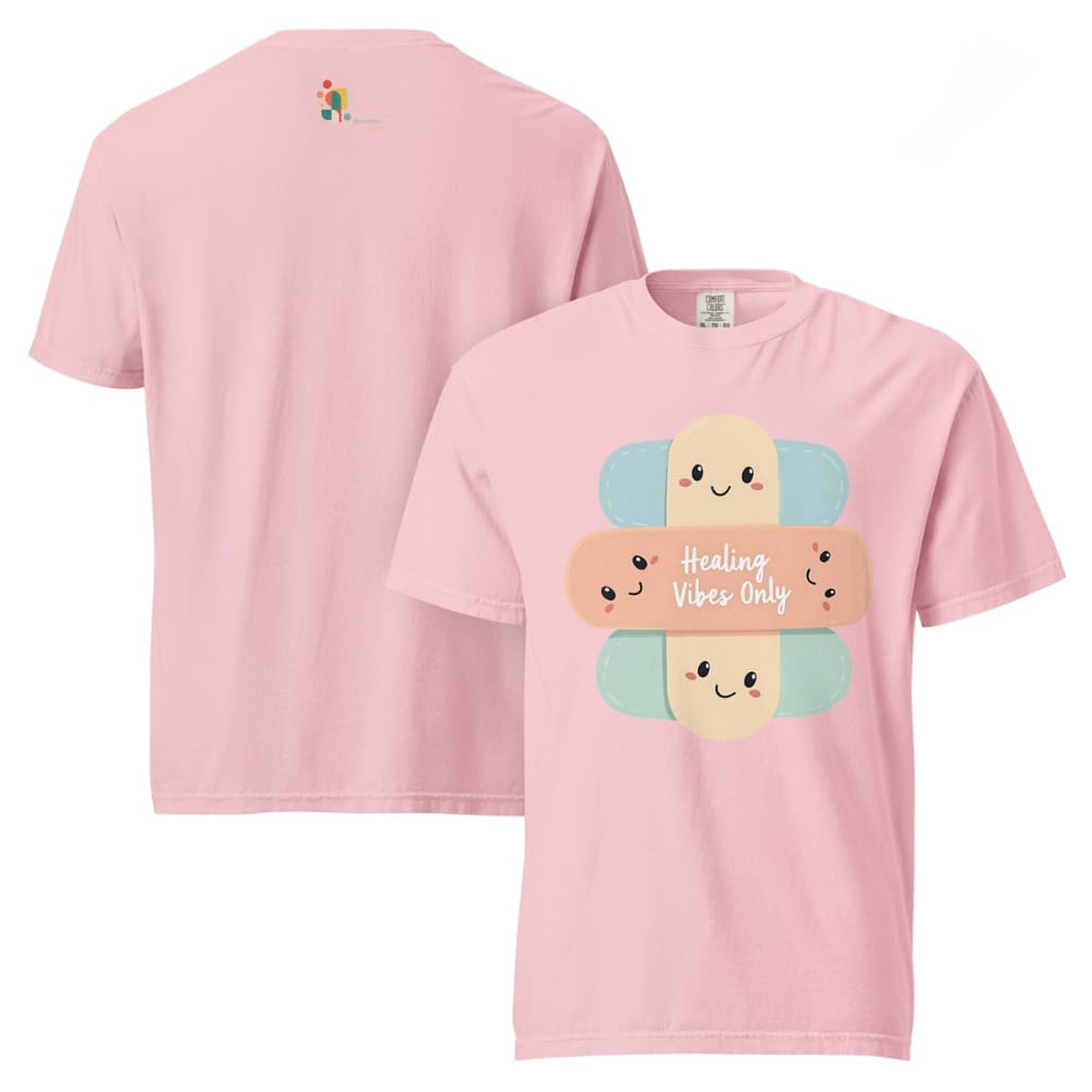 Pink t-shirt with cartoon bandages and 'Healing Vibes Only' text on a white background