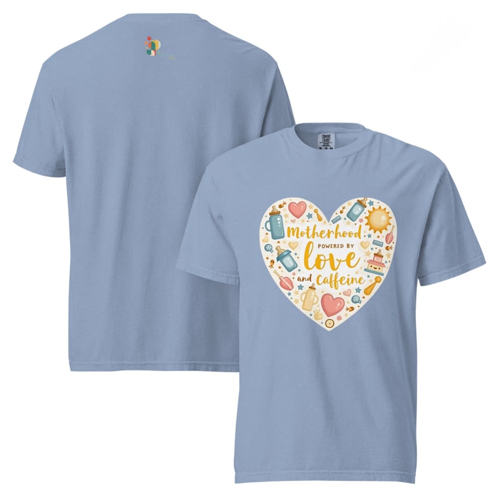 Light blue t-shirt with a heart-shaped design featuring 'Motherhood fueled by love and caffeine' text on a white background.