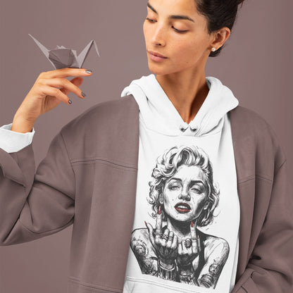 Person wearing a hoodie with a graphic design of a tattooed woman, holding an origami crane.