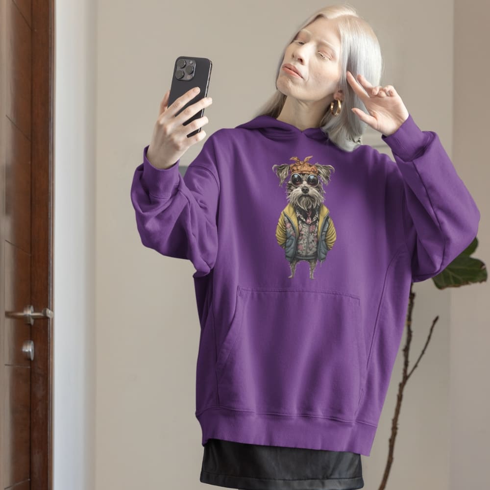 Person wearing a purple hoodie with a dog graphic, taking a mirror selfie.