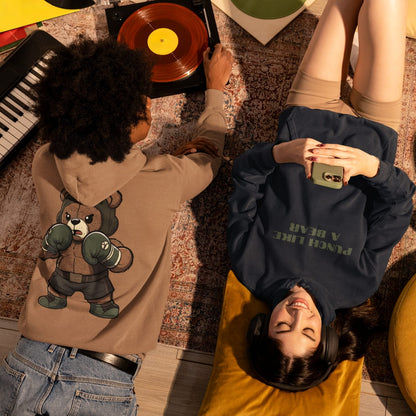 Two people interacting with vinyl records on a patterned floor.