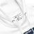 White garment with a label on a white background