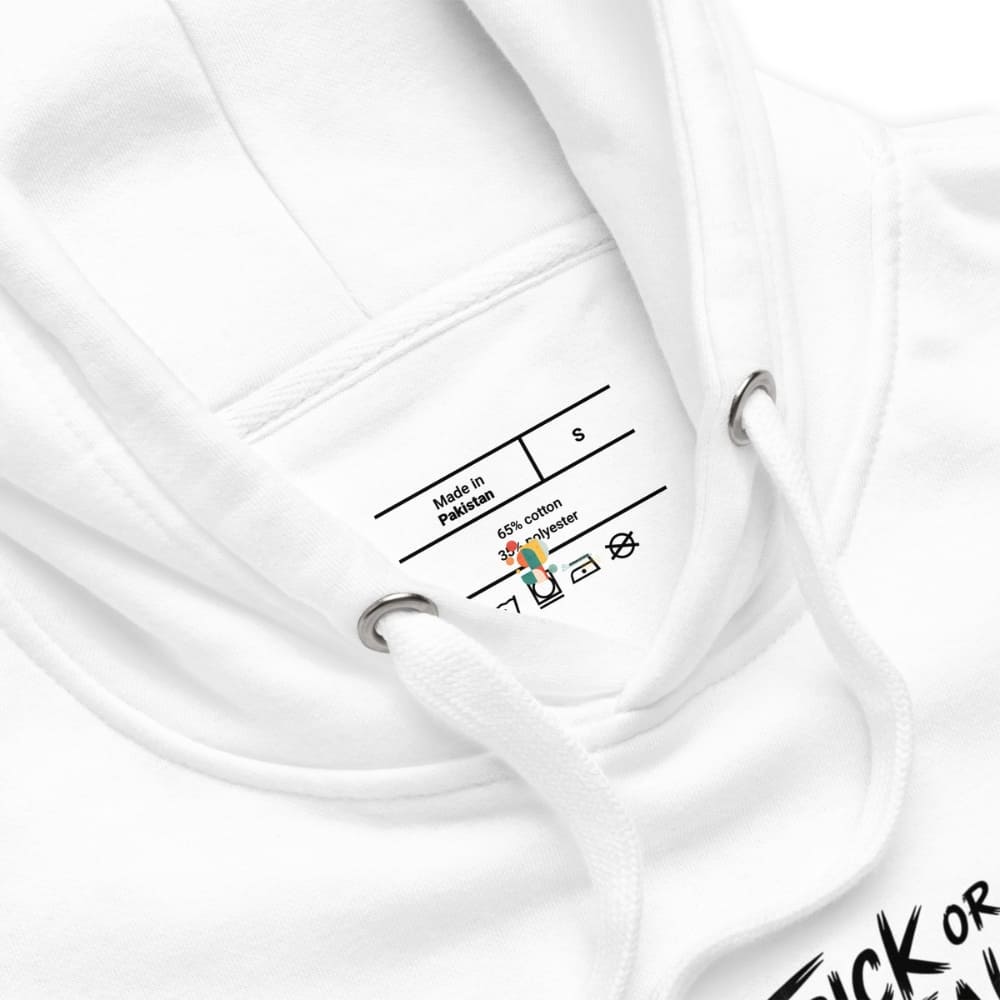 Close-up of a white garment with a label on a white background