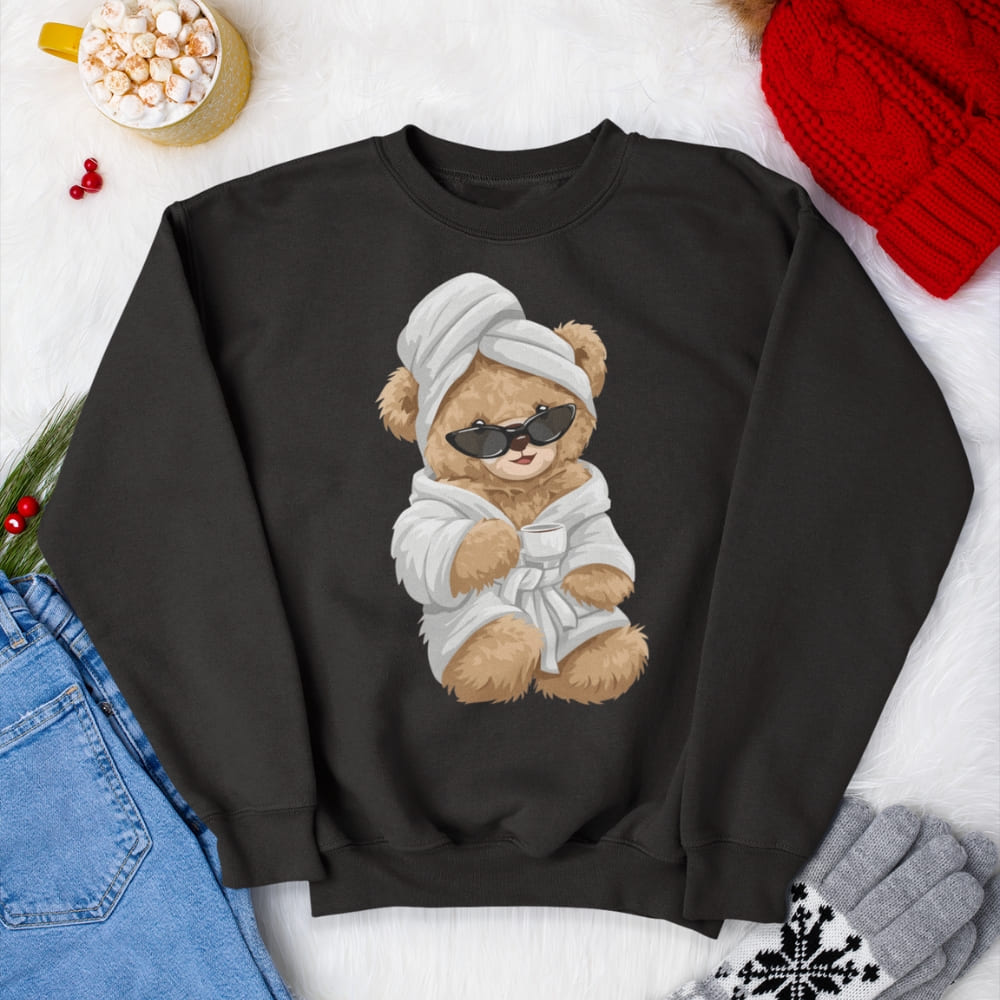 Black sweatshirt with a teddy bear design wearing sunglasses, a robe, and a towel on a white background.
