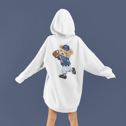 White hoodie with a bear graphic in a baseball uniform on a dark blue background