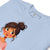 Light blue t-shirt with an illustration of a girl with brown hair on a white background