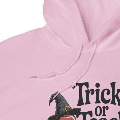 Pink hoodie with a witch hat and pumpkin design on a white background
