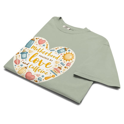 Green t-shirt with a colorful heart design and text on a white background