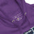 Close-up of a purple hoodie with a label on the chest area.