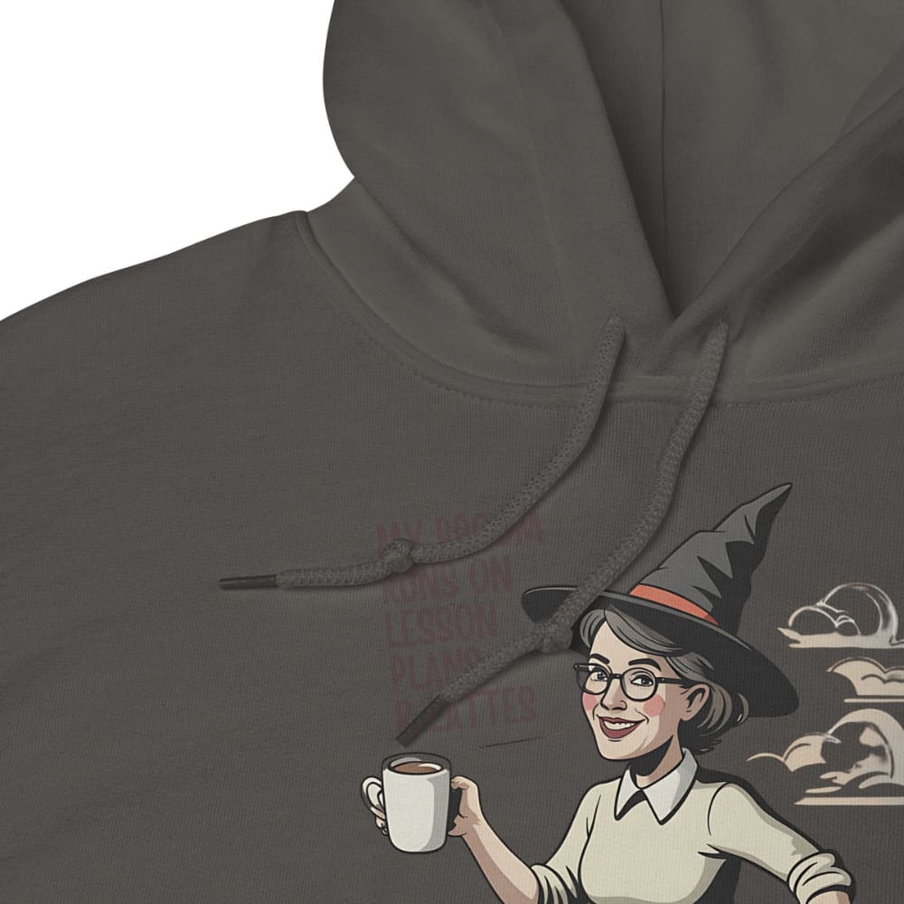 Hoodie with a design of a person wearing a witch hat and holding a coffee cup, set against a dark gray background.