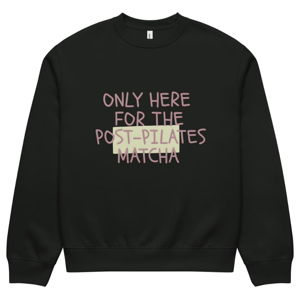 Black sweatshirt with text 'Only here for the post-pilates matcha' on a white background