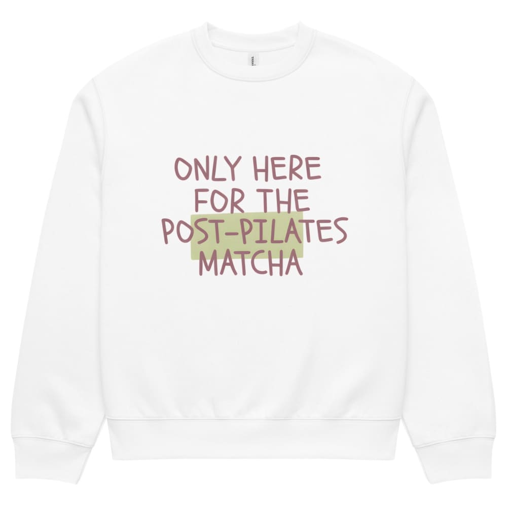 White sweatshirt with text 'Only here for the post-pilates matcha' on a white background
