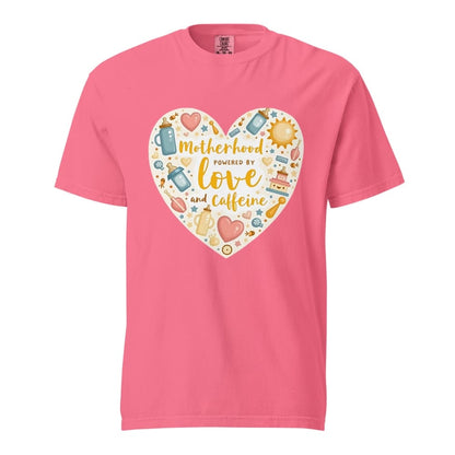 Pink t-shirt with a heart-shaped design featuring text and icons on a white background