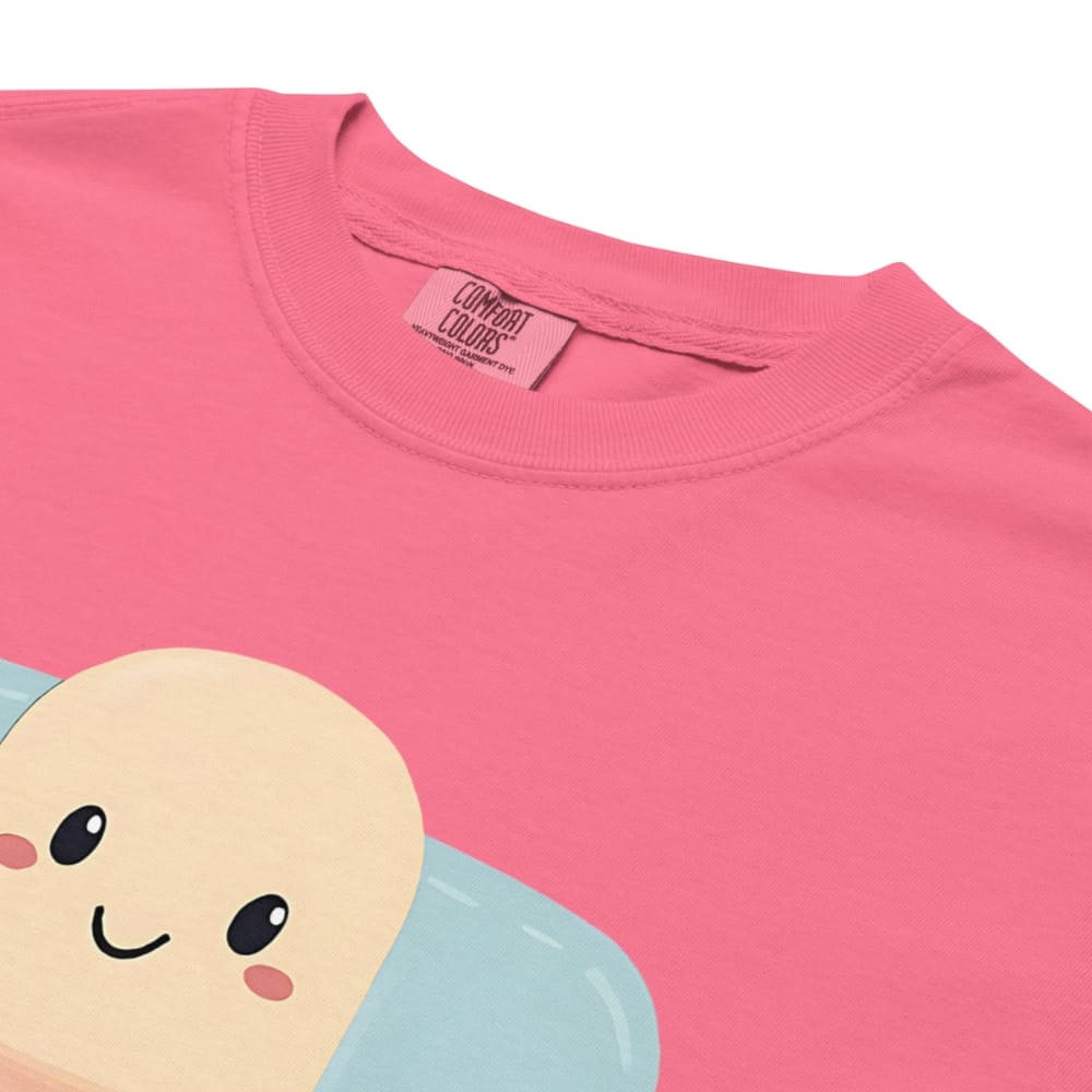 Pink t-shirt with a cartoon character on a white background
