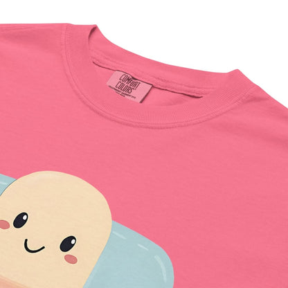 Pink t-shirt with a cartoon character on a white background