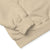 Close-up of beige fabric with a subtle texture on a white background