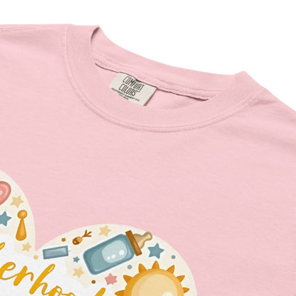 Pink t-shirt with baby-themed graphics and 'Comfort Colors' label