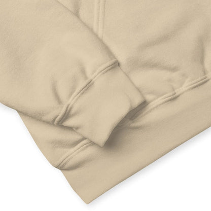 Close-up of beige fabric with a subtle texture on a white background
