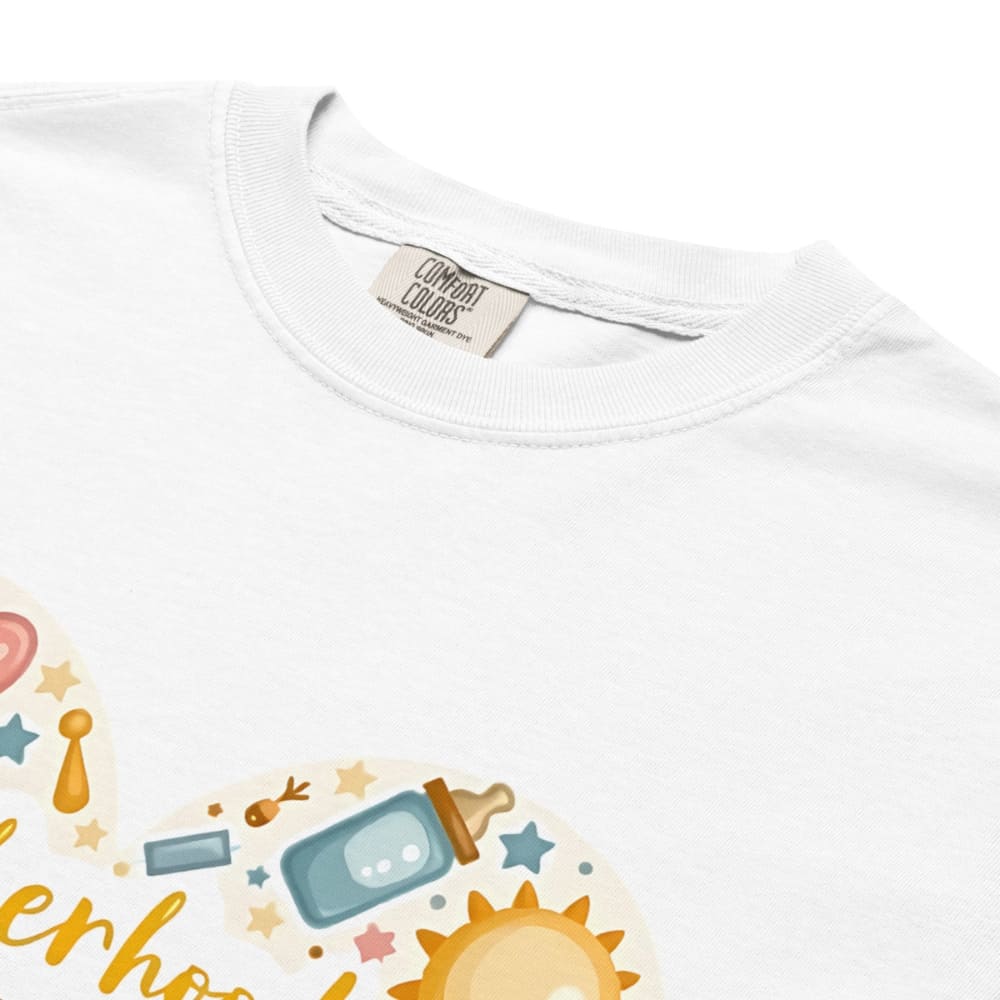 White t-shirt with colorful baby-themed graphics and 'Comfort Colors' label.