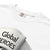 White t-shirt with 'Global Heroes' text and Comfort Colors label.