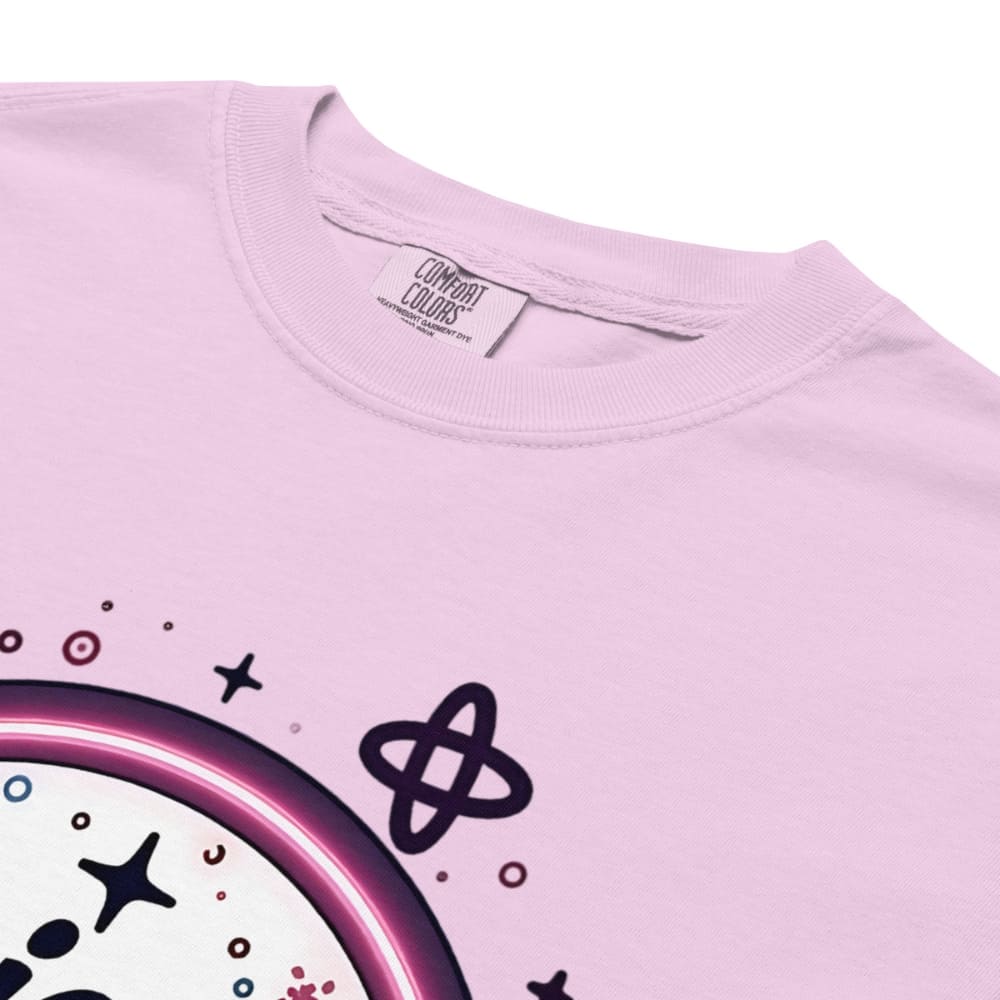 Close-up of a pink t-shirt with a graphic design on a white background