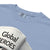 Light blue t-shirt with 'Global Heroes' text and Comfort Colors tag.
