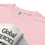 Pink t-shirt with 'Global Heroes' text and Comfort Colors label.