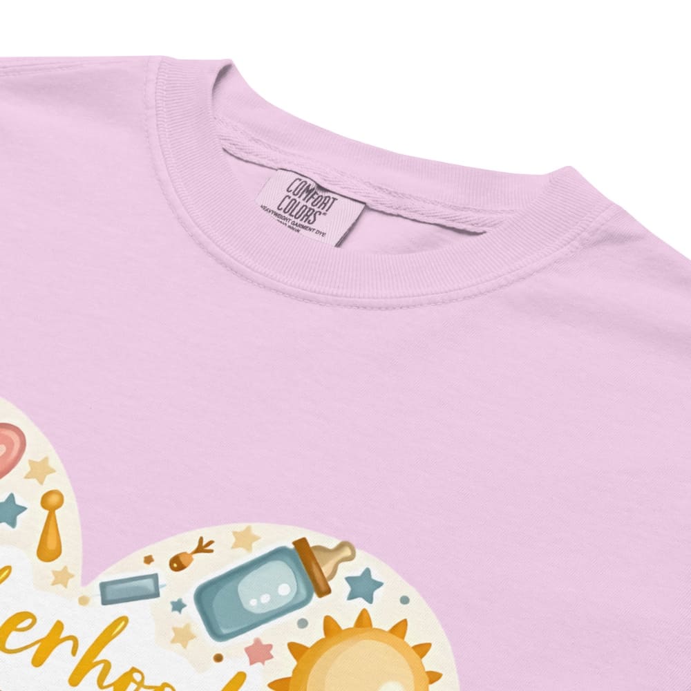 Light purple t-shirt with colorful graphics and 'Comfort Colors' label.