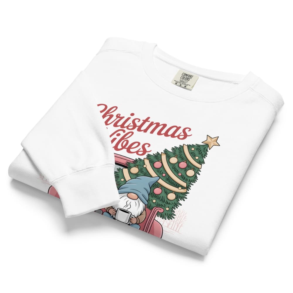 White sweatshirt with Christmas design and text on a white background