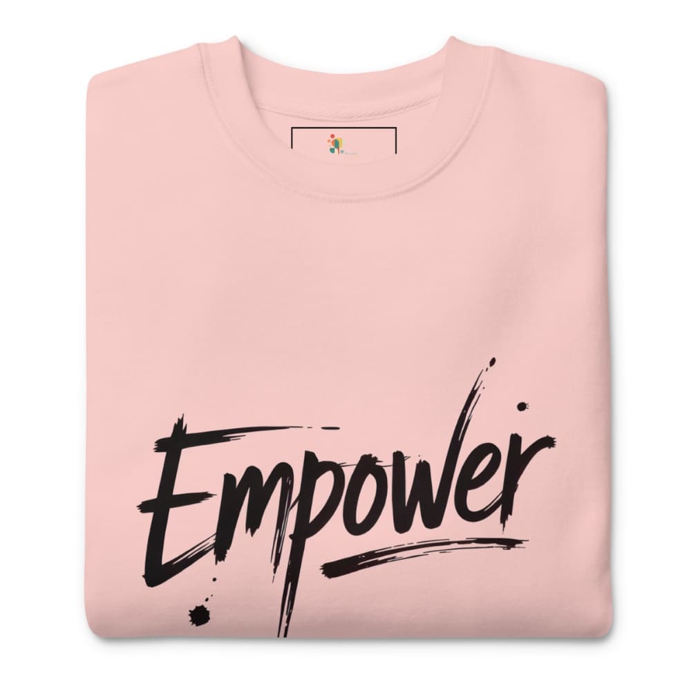 Pink sweatshirt with 'Empower' text on a white background