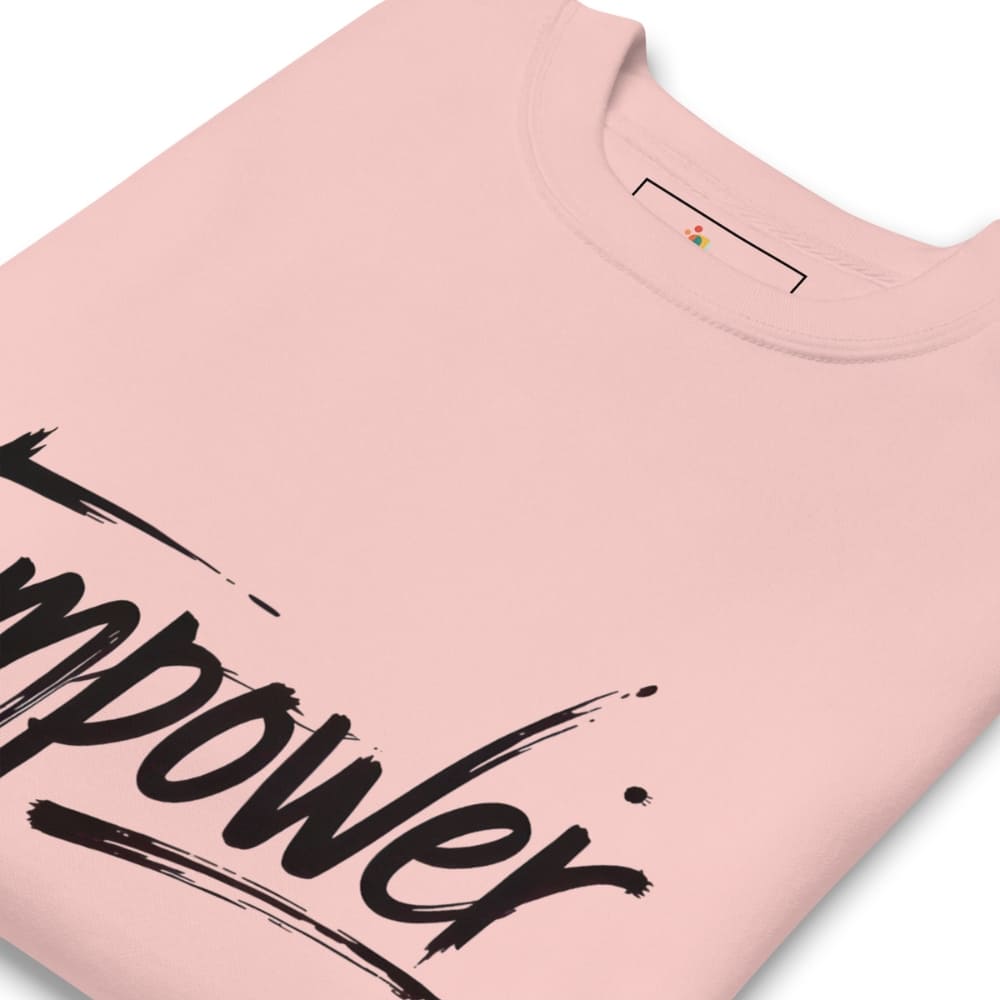Pink t-shirt with 'empower' text on a white background
