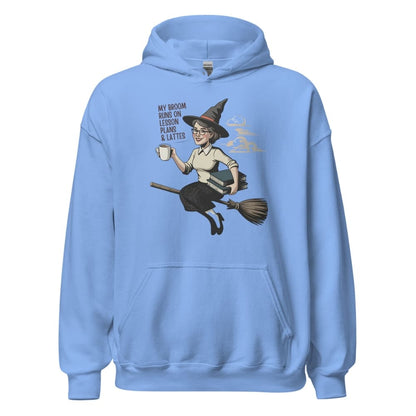Light blue hoodie with a graphic of a woman on a broom and text on a white background