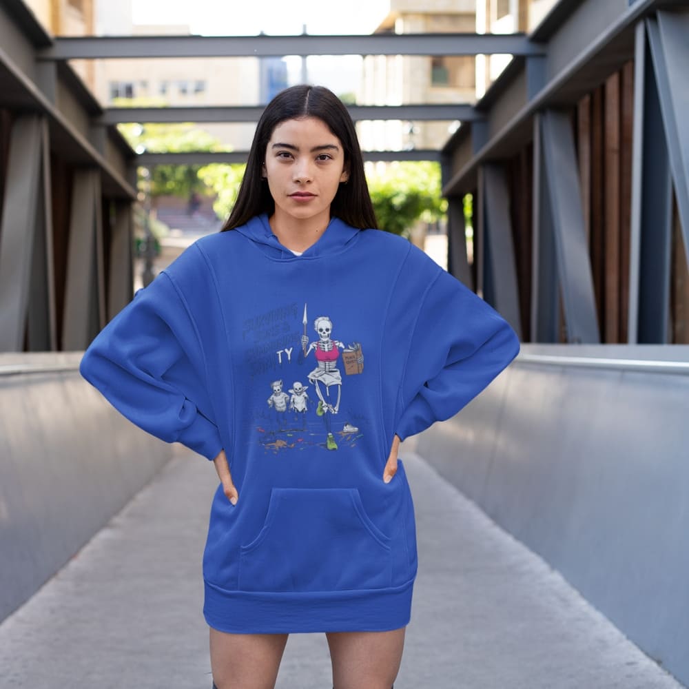 Person wearing a blue hoodie with a graphic design in an urban setting