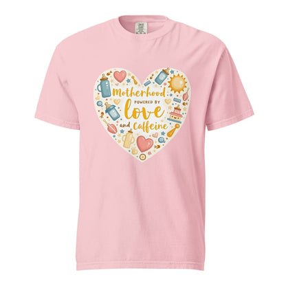 Pink t-shirt with a colorful heart design and text on a white background