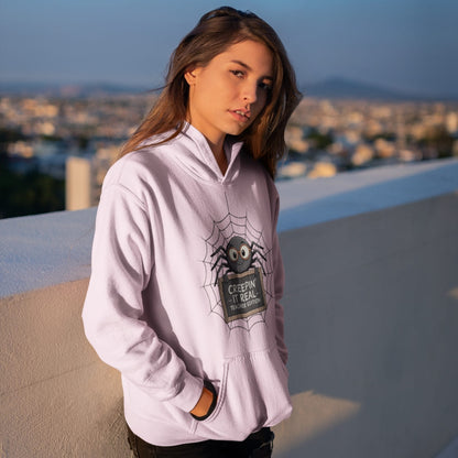 Person wearing a light purple hoodie with a spider graphic, standing on a rooftop with a cityscape in the background.