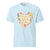 Light blue t-shirt with a colorful heart design and text on a white background