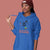 Person wearing a blue hoodie with a graphic design and text on a pink background