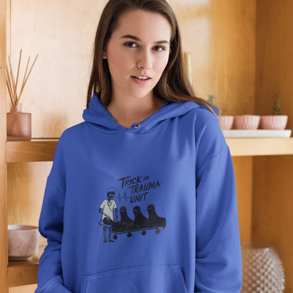 Person wearing a blue hoodie with a graphic design and text.