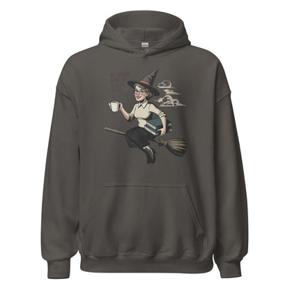Dark gray hoodie with a graphic of a witch on a broom holding a coffee cup on a white background