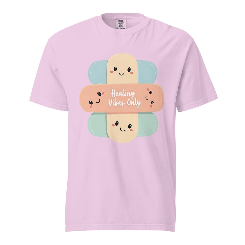 Pink t-shirt with cartoon bandages and 'Healing Vibes Only' text on a white background