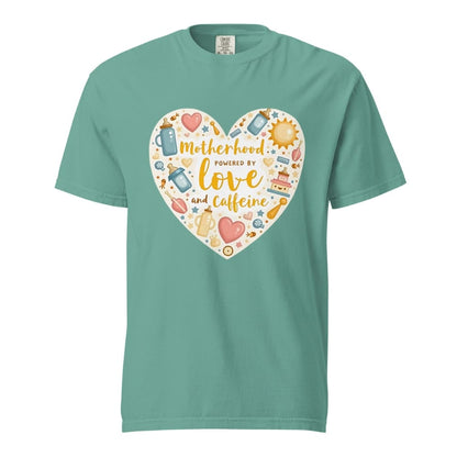 Teal t-shirt with a heart-shaped design featuring text and icons on a white background