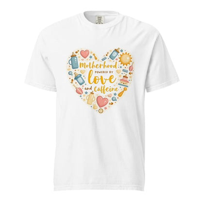 White t-shirt with colorful graphic and text 'Motherhood powered by love and caffeine' on a white background