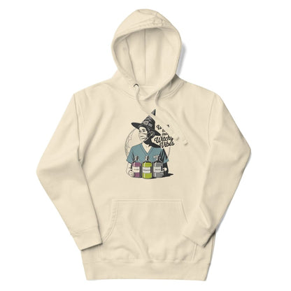 Beige hoodie with a graphic design of a witch and potion bottles on a white background